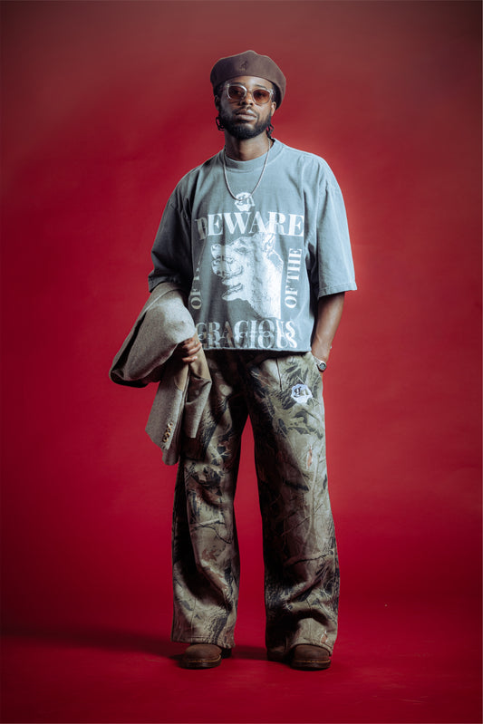 “Beware of the Gracious” Premium drop shoulder T-shirt (charcoal gray)